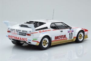 BMW M1 Motul #10 B. Darniche / A. Mahe Rally Tour de Corse 1982 IXO 1:18 18RMC114 Metāls — attēls 2 no 6