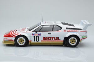 BMW M1 Motul #10 B. Darniche / A. Mahe Rally Tour de Corse 1982 IXO 1:18 18RMC114 Metāls — attēls 3 no 6