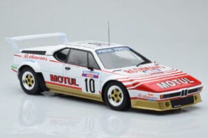 BMW M1 Motul #10 B. Darniche / A. Mahe Rally Tour de Corse 1982 IXO 1:18 18RMC114 Metāls — attēls 4 no 6