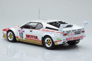 BMW M1 Motul #10 B. Darniche / A. Mahe Rally Tour de Corse 1982 IXO 1:18 18RMC114 Metāls — attēls 5 no 6