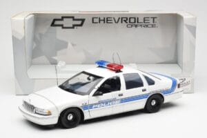 Chevrolet Caprice Sebring Policija UT Models 1:18 21029 Metāls — attēls 6 no 6