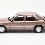 Mercedes 230E W124 Rosewood Metallic Dīlera Izdevums Norev 1:18 - image 4 of 8