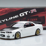 Nissan Skyline GT-R R34 Nismo Z-Tune Balts MotorHelix 1:18 - image 11 of 11