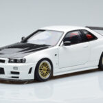 Nissan Skyline GT-R R34 Nismo Z-Tune Balts MotorHelix 1:18