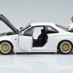 Nissan Skyline GT-R R34 Nismo Z-Tune Balts MotorHelix 1:18 - image 4 of 11
