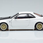 Nissan Skyline GT-R R34 Nismo Z-Tune Balts MotorHelix 1:18 - image 5 of 11
