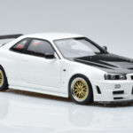 Nissan Skyline GT-R R34 Nismo Z-Tune Balts MotorHelix 1:18 - image 6 of 11