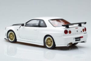 Nissan Skyline GT-R R34 Nismo Z-Tune Balts MotorHelix 1:18 M83407 Metāls — attēls 7 no 11