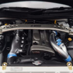 Nissan Skyline GT-R R34 Nismo Z-Tune Balts MotorHelix 1:18 - image 9 of 11