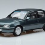 Opel Kadett E GSi Zils Metallik Norev 1:18 183614 Metāls