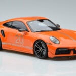 Porsche 911 992 Turbo S China 20th Anniversary Oranžs Minichamps 1:18 - image 4 of 6