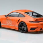 Porsche 911 992 Turbo S China 20th Anniversary Oranžs Minichamps 1:18 - image 5 of 6