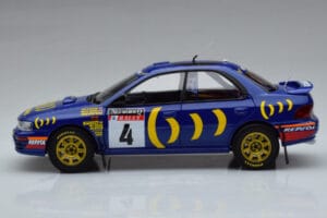 Subaru Impreza #4 C. McRae / D. Ringer Winner RAC Rally 1994 Kyosho 1:18 08962A Metāls — attēls 4 no 9