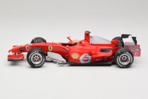 Ferrari 248 F1 #5 M. Schumacher German GP Hockenheimring 2006 Hot Wheels 1:18 J2887 Metāls — attēls 3 no 6