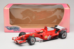 Ferrari 248 F1 #5 M. Schumacher German GP Hockenheimring 2006 Hot Wheels 1:18 J2887 Metāls — attēls 6 no 6