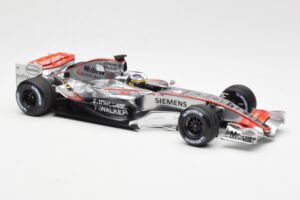 McLaren Mercedes MP4-21 P. de la Rosa F1 Showcar 2006 Minichamps 1:18 B66962346 Metāls — attēls 4 no 6