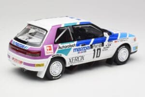 Mazda 323 GTX #10 T. Makinen / S. Harjanne 1000 Lakes Rally 1991 Otto 1:18 OT1099 Sveķi — attēls 2 no 6