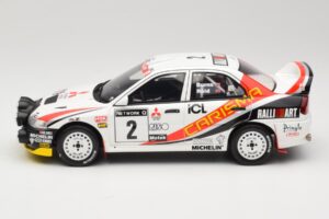 Mitsubishi Carisma GT Group N2 R. Burns / R. Reid RAC Rally 1997 Balts Otto 1:18 OT1192 Sveķi — attēls 3 no 6
