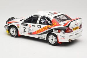 Mitsubishi Carisma GT Group N2 R. Burns / R. Reid RAC Rally 1997 Balts Otto 1:18 OT1192 Sveķi — attēls 5 no 6