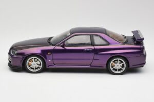 Nissan Skyline GT-R R34 V-Spec Midnight Lillā AUTOart 1:18 77305 Metāls — attēls 4 no 8