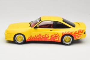 Opel Manta B Mattig Dzeltens ar Liesmu MCG 1:18 MCG18115 Metāls — attēls 3 no 6