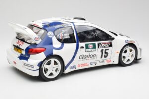 Peugeot 206 WRC G. Panizzi / H. Panizzi Tour de Corse 1999 Otto 1:12 G081 Sveķi — attēls 2 no 6