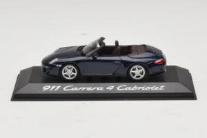 Porsche 911 997 Carrera 4 Kabriolets Tumši Zils Minichamps 1:43 WAP02015216-R1 Metāls