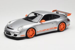 Porsche 911 997.1 GT3 RS Sudrabs ar Oranžiem Diskiem Minichamps 1:18 155062120 Metāls