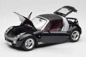 Smart Roadster Tumšzils Bburago 1:18 34917 Metāls — attēls 2 no 8