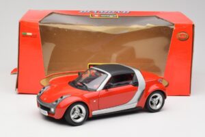 Smart Roadster Sarkans Bburago 1:18 34099 Metāls — attēls 8 no 8