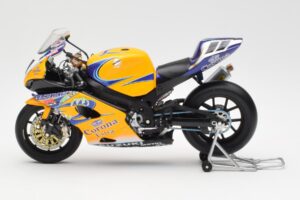 Suzuki GSX-R 1000 Team Alstare Corona Extra T. Corser WSB 2005 Minichamps 1:12 122052211 Metāls