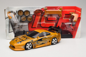 Toyota Supra A80 Zeltainis Tunerz Edition Hot Wheels 1:18 B6091 Metāls — attēls 2 no 7