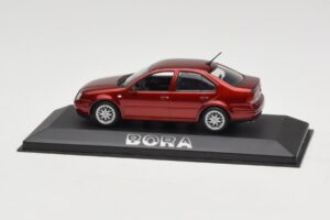 Volkswagen Bora Mk4 Red Metallic Minichamps 1:43 VW003 Metāls