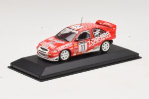 Ford Escort Cosworth Toshiba #11 A. Vatanen / Freeman 1994 Minichamps 1:43 430981811 Metāls — attēls 2 no 4