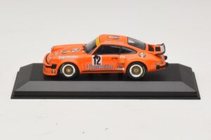 Porsche 911 934 Jagermeister #12 H. Kelleners DRM Nurburgring 1976 Minichamps 1:43 400766412 Metāls
