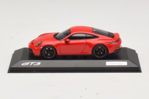 Porsche 911 992 GT3 Touring Sarkans Minichamps 1:43 WAP02012617-R1 Metāls